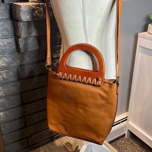Faux leather cognac color crossbody purse with wooden handle